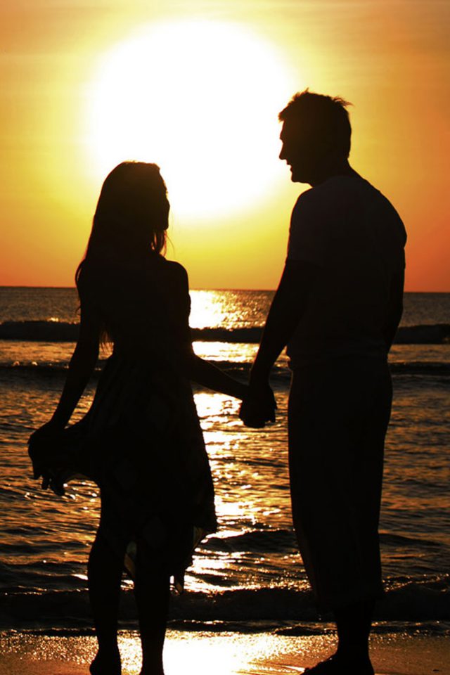 Sunset Beach Couple Android wallpaper